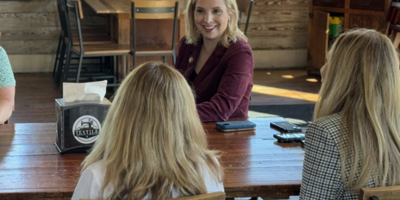 Rep. Hinson speaks with Iowa women at a roundtable for working families.